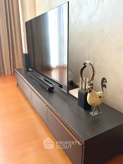 Modern living room with sleek TV stand and stylish decor