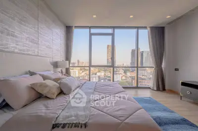 Luxurious bedroom with panoramic city view and elegant decor