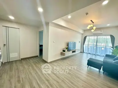 Spacious modern living room with elegant decor and natural light