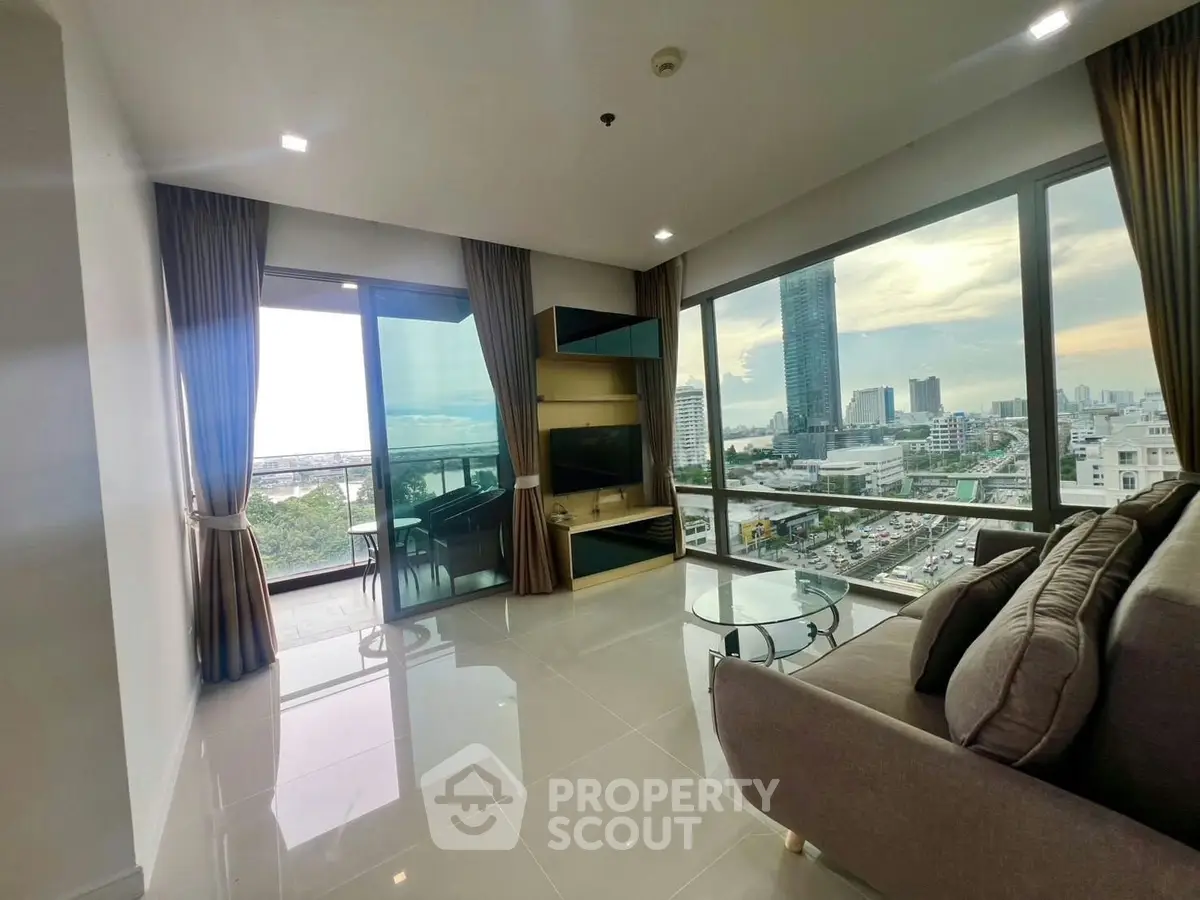 Spacious living room with stunning city view and modern furnishings