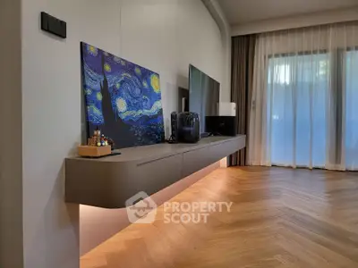Modern living room with floating TV console and elegant decor