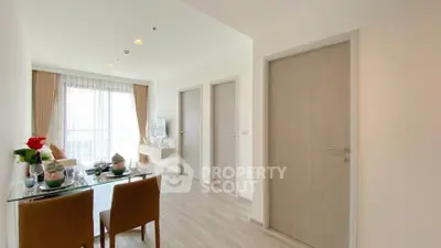 Bright and modern living room with dining area in a stylish apartment