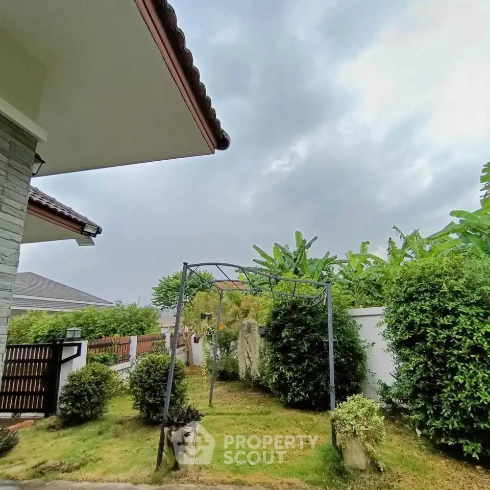 Charming garden view with lush greenery and elegant landscaping in a serene residential area.