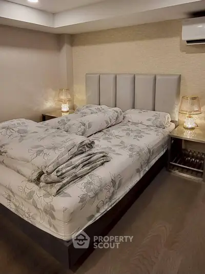 Luxurious bedroom with elegant lighting and modern decor