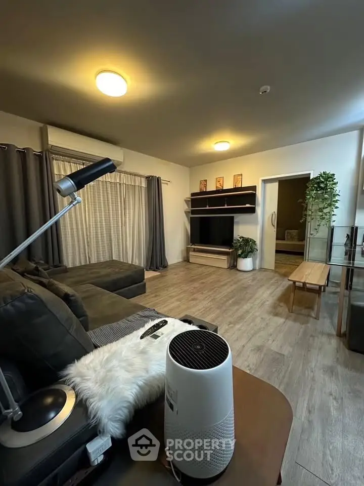 Spacious modern living room with stylish decor and cozy ambiance