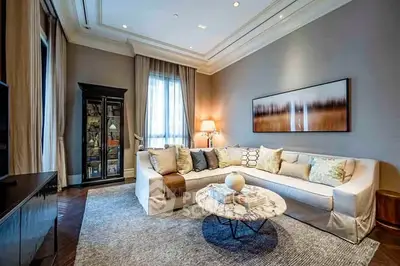 Luxurious living room with elegant decor and cozy seating area.