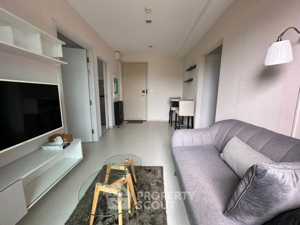 Modern living room with stylish furniture and sleek decor in a contemporary apartment.