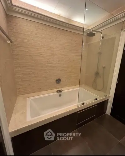 Luxurious bathroom with modern bathtub and elegant tile design