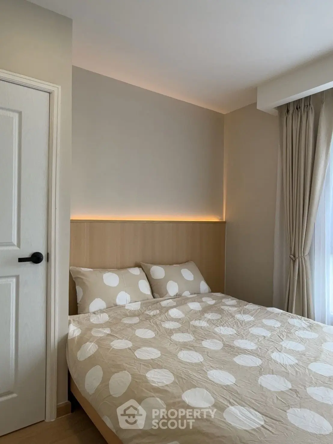Cozy bedroom with modern decor and natural light
