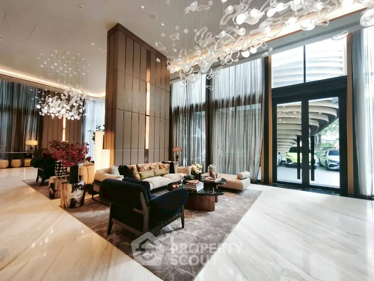 Luxurious modern living room with high ceilings and elegant decor in a premium real estate property.