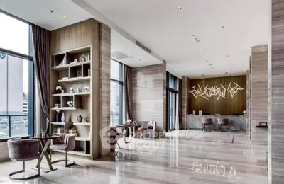 Luxurious modern living room with elegant decor and floor-to-ceiling windows offering stunning city views.