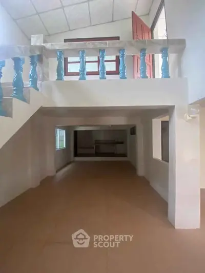 Spacious interior with unique architectural design and open layout