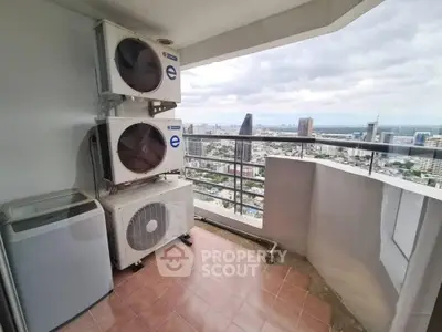 High-rise balcony with city view and air conditioning units, perfect for urban living.