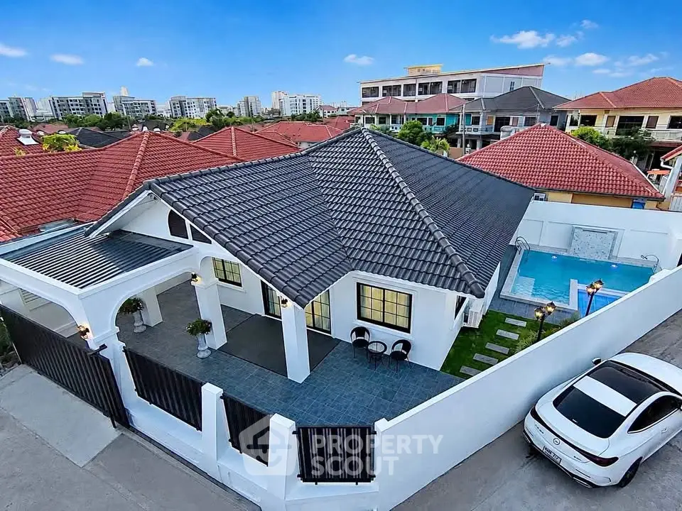 Charming single-story home with pool and modern roof in vibrant neighborhood.