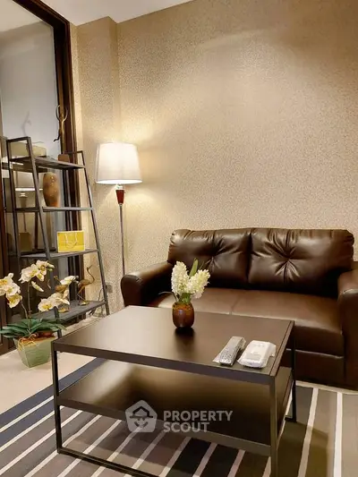 Cozy living room with leather sofa and modern decor