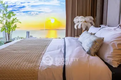 Luxurious bedroom with stunning ocean view and elegant decor