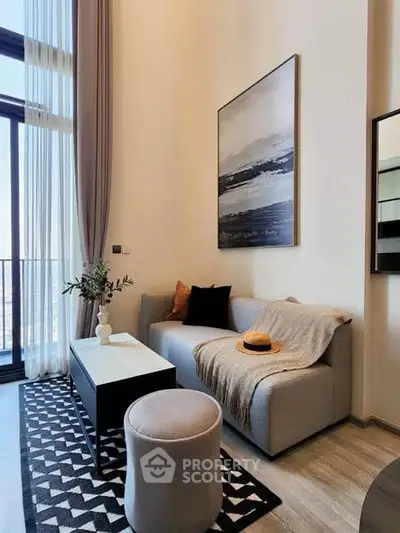 Modern living room with high ceilings and stylish decor