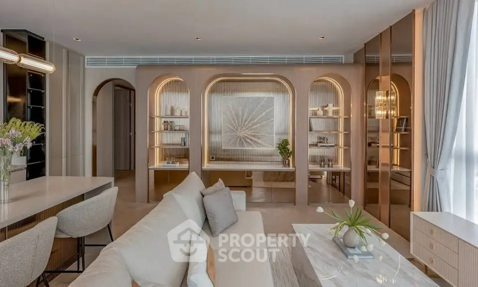 Luxurious modern living room with elegant decor and open layout, featuring stylish furniture and ambient lighting.