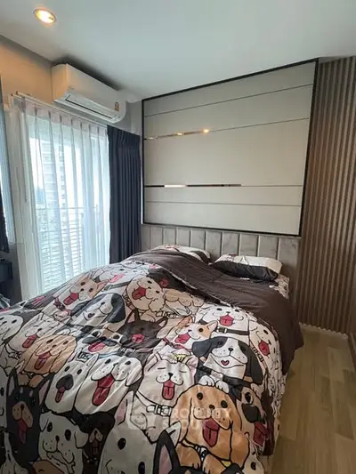 Cozy bedroom with playful dog-themed bedding and modern decor