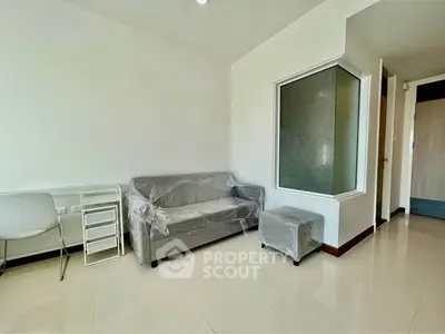 Modern living room with minimalist furniture and natural light