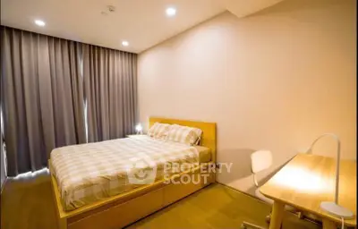 Modern bedroom with cozy lighting and stylish furniture