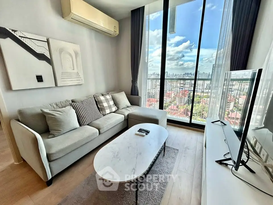 Modern living room with panoramic city view and stylish decor