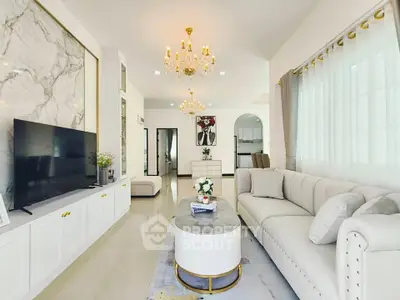 Luxurious living room with elegant chandelier and modern decor