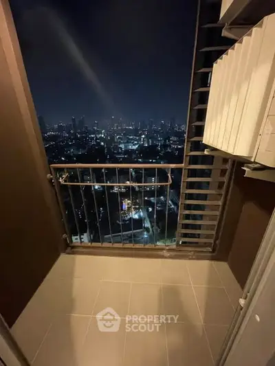 Stunning night cityscape view from a modern apartment balcony, perfect for urban living enthusiasts.