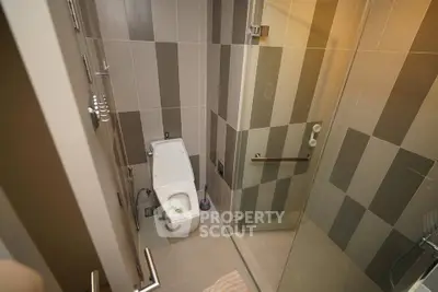 Modern bathroom with sleek design and glass shower enclosure