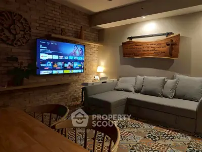 Cozy living room with modern decor and wall-mounted TV