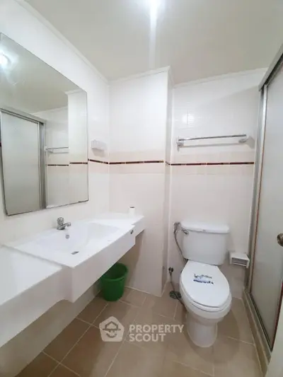 Modern bathroom with sleek fixtures and spacious layout