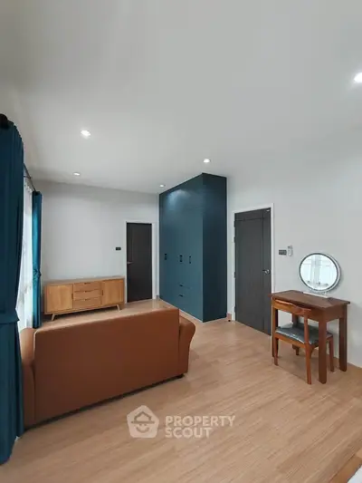 Spacious living room with modern furniture and elegant decor