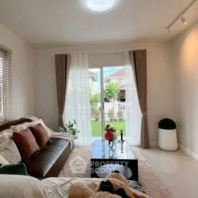 Cozy living room with garden view and elegant decor