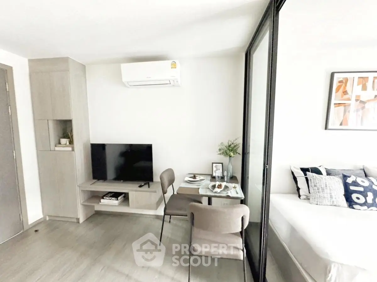 Modern studio apartment with sleek design and cozy furnishings