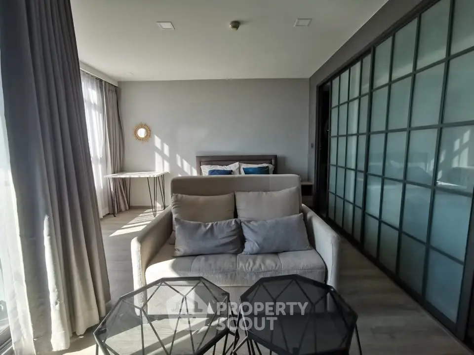 Modern studio apartment with stylish decor and ample natural light