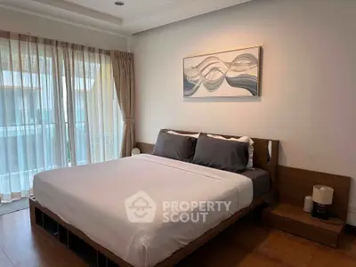 Modern bedroom with large bed and stylish decor in a bright apartment