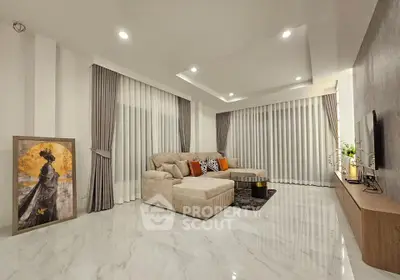 Spacious modern living room with elegant decor and large windows