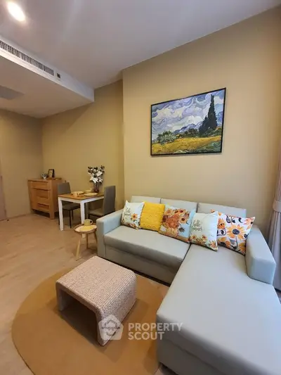 Cozy living room with stylish decor and comfortable seating in modern apartment.