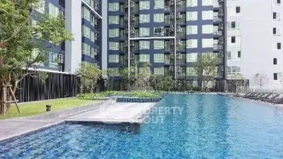 Luxurious condominium with stunning pool and modern architecture