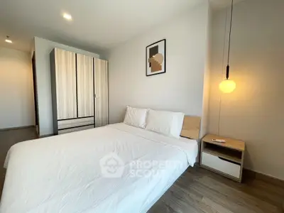 Modern minimalist bedroom with cozy lighting and stylish wardrobe