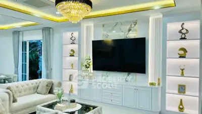 Luxurious living room with elegant decor and modern chandelier