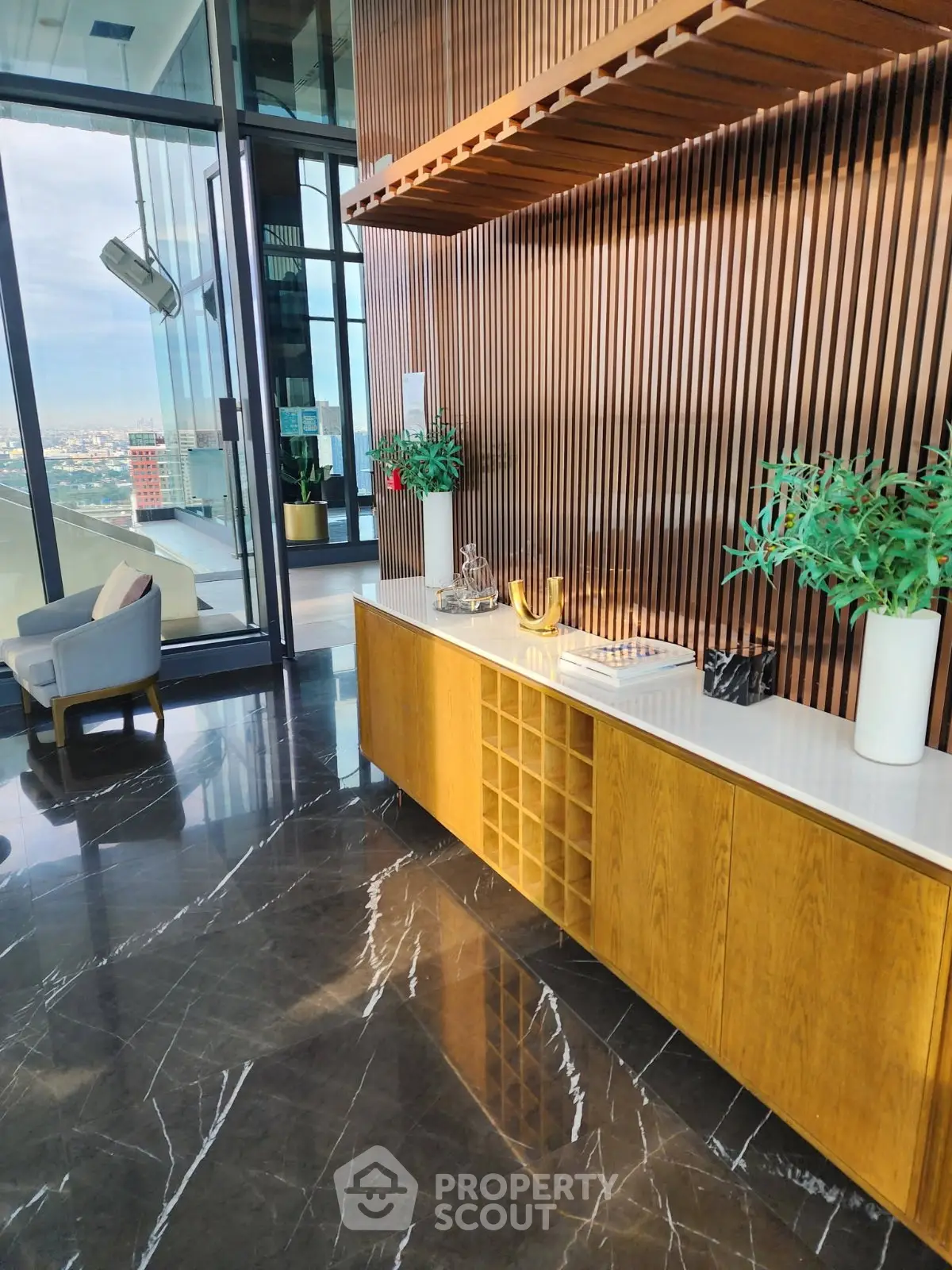 Luxurious modern living room with stunning city view and elegant wooden accents