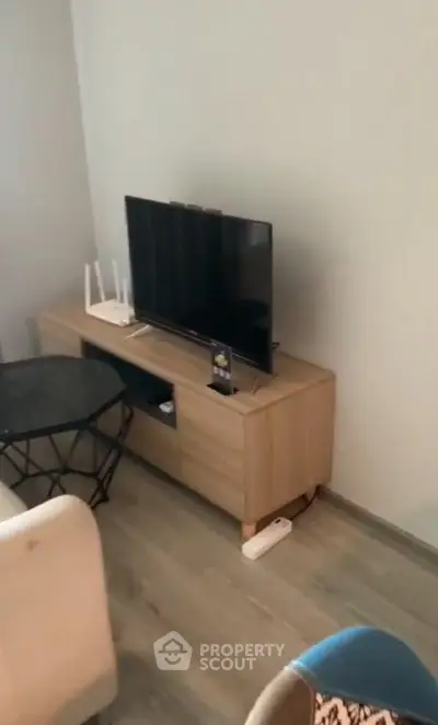 Modern living room with sleek TV stand and stylish decor