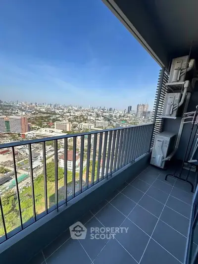 Stunning cityscape view from a modern high-rise balcony, perfect for urban living enthusiasts.