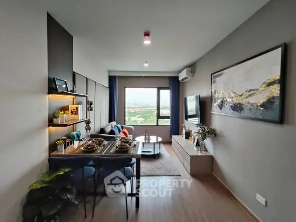 Modern living room with dining area and city view, featuring stylish decor and natural light.