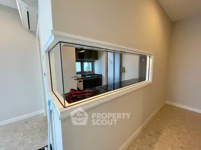 Modern kitchen with sleek design and open layout, featuring stainless steel appliances and stylish countertops.