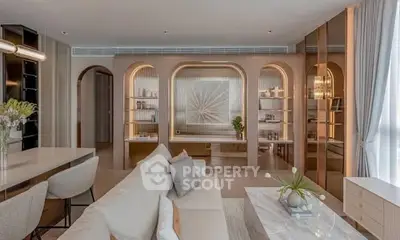 Luxurious modern living room with elegant decor and open layout, featuring stylish furniture and ambient lighting.