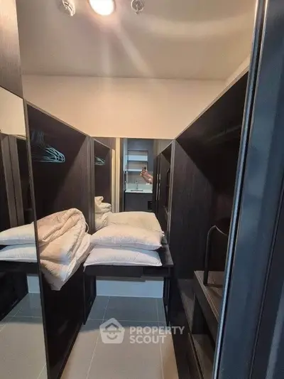 Spacious walk-in closet with modern shelving and ample storage space.