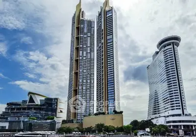 Stunning modern skyscrapers with lush greenery and vibrant cityscape.