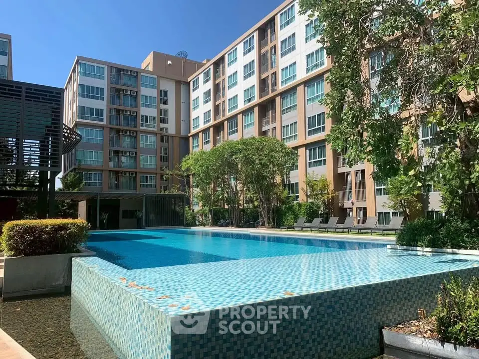 Luxurious condominium with stunning pool and modern architecture